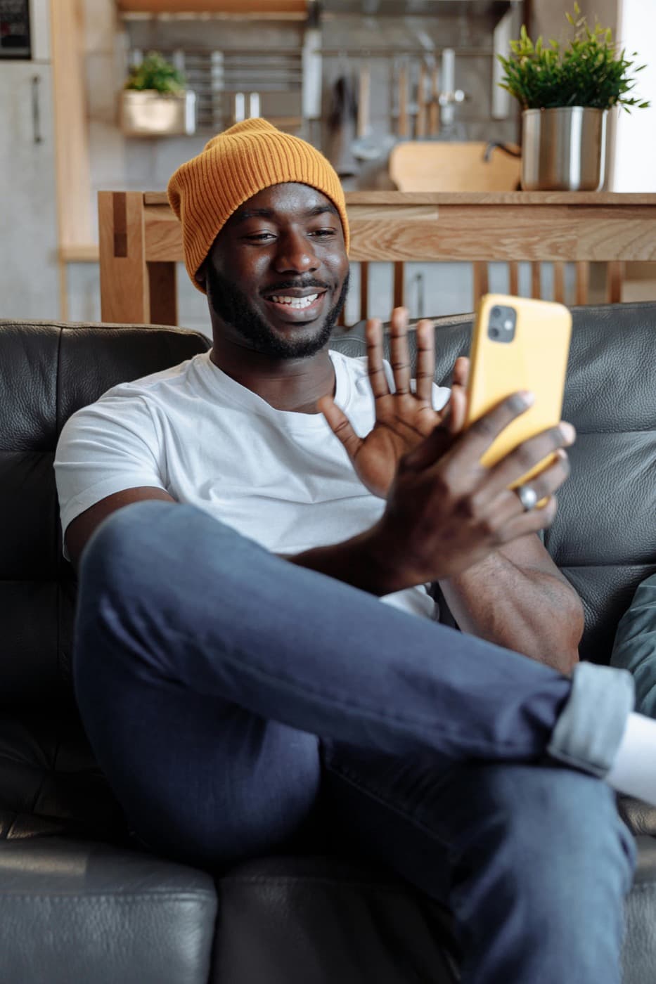 Person completing a telehealth intake on a phone from home